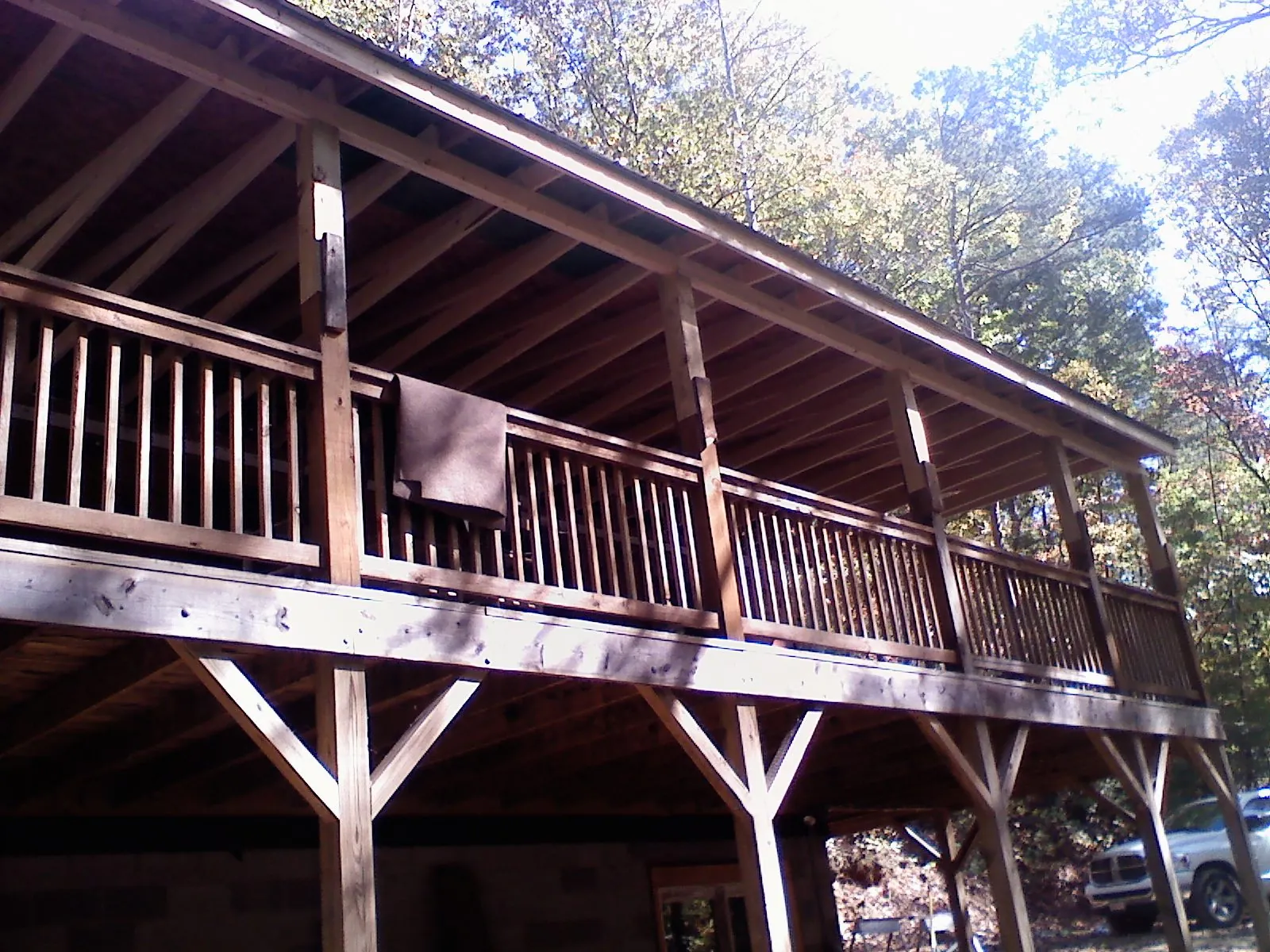 Timber framing under a new elevated porch and deck — Roof Leak Repair in Novelty by Roofing Brothers